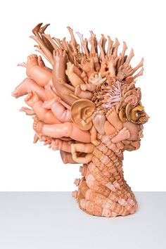Dollface: Bizarre Portraits Made from Repurposed Toy Parts by Freya Jobbins toys sculpture assemblage anatomy
